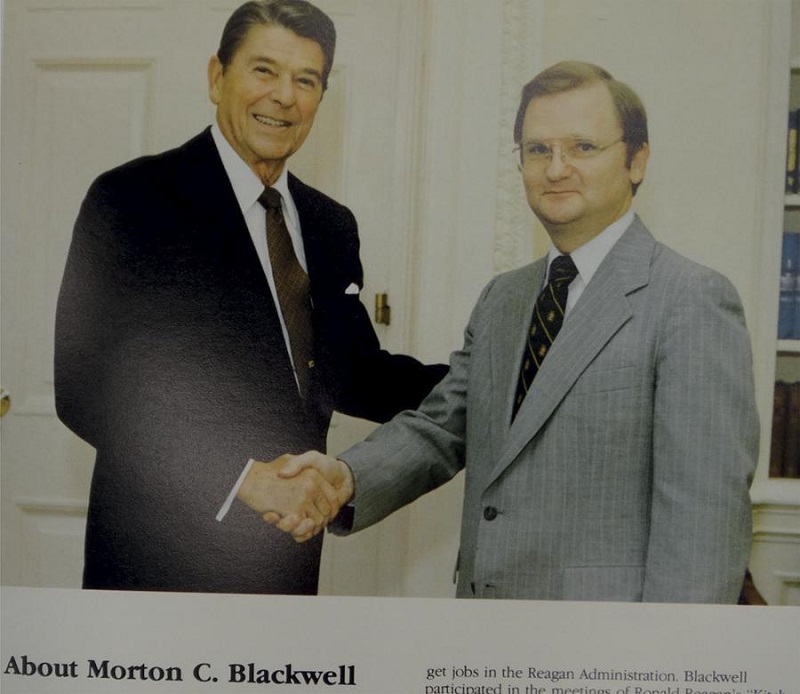 Morton Blackwell posing with President Reagan in IPF Promotional Literature. Source: International Policy Forum Prospectus, 1984-1985 [n.d.], 5.