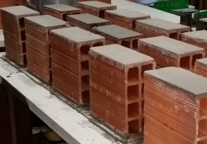 Capping of ceramic blocks.