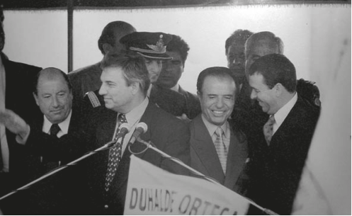 De izquierda a derecha: Jorge Busti, Carlos Stratta, Carlos Menem y Luis Márquez.