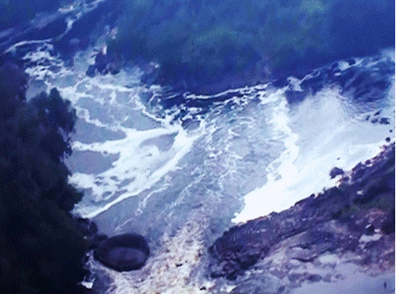 The sacred waterfalls of Hipana, birthplace of humanity at the holes in the center of the rapids; the first earth is the boulder on lower left