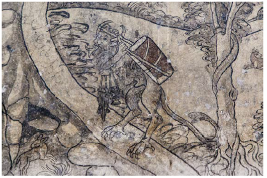 Detalle de la Tebaida de Actopan. El personaje con cuernos demoniacos, lengua bífida, garras como de ave y con un rostro en el lugar del estómago, sostiene un tambor mediante dos correas enredadas en los cuernos, el instrumento nos recuerda a los tambores indígenas; de uno de sus brazos cuelgan un sahumerio y una bolsa de copal (incienso nativo), según las convenciones indígenas.