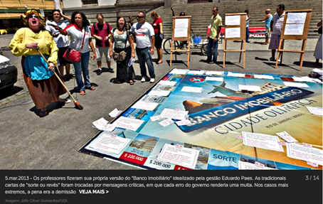 Figura 4- Professores exibindo o jogo
"Banco Imobiliário Cidade Olímpica” modificado, em intervenção na
Cinelândia.