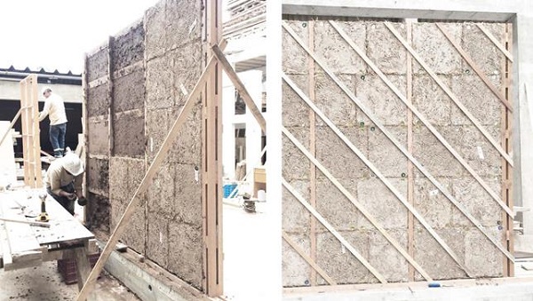 3. Vistas del panel experimental con estructura de madera y elementos prefabricados de tierra alivianada.