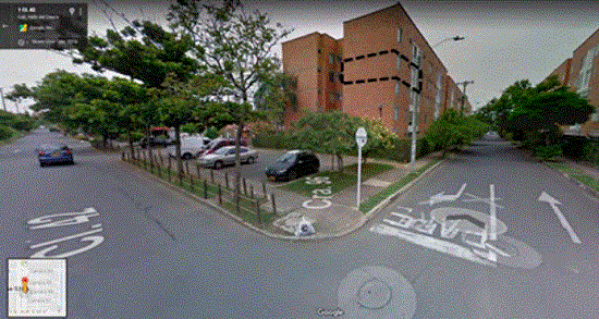 Vista exterior de la edificaci&oacute;n experimental, donde se indica la unidad de vivienda analizada.