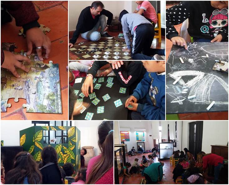 Visitantes escolares interactuando con los recursos didácticos