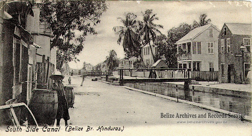 SOUTH SIDE CANAL, BELIZE BRITISH HONDURAS. PEOPLE AND HOUSES NEAR CANAL