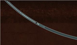 Lowering the fracturing device through the tubing column.