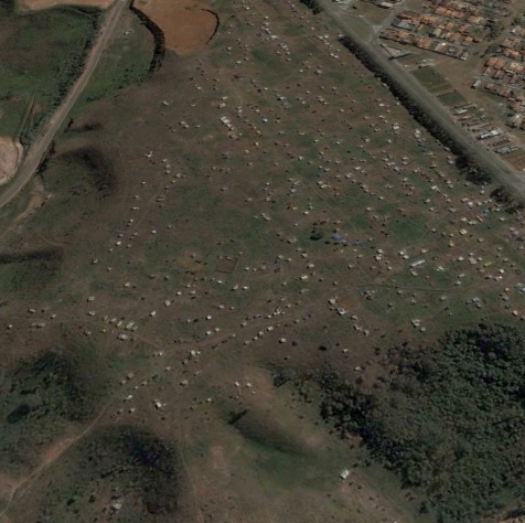 - Imagem a&eacute;rea do Pinheirinho antes da ocupa&ccedil;&atilde;o (ano de 2004). 