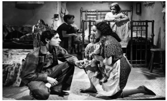 Fotograma
de Los Olvidados ejemplo de familia monoparental extensa