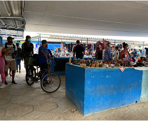 La vida mercantil bajo un puente