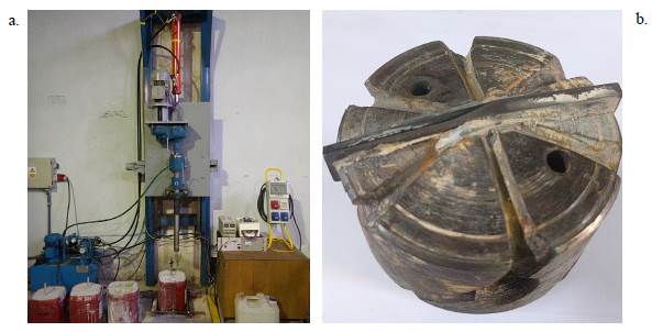 a. Sistema completo de perforación con control de velocidad, central hidráulica, y herramienta de perforación. b. Detalle de la broca con cuerpo realizado en SAE 4140, dos filos de carburo de tungsteno y salidas de fluido. 