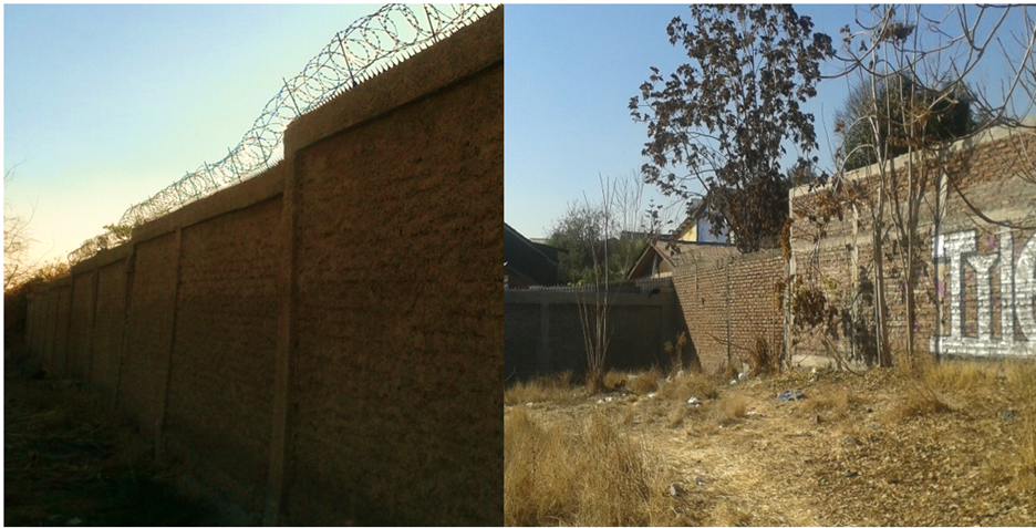 Muro que separa la villa del campamento.