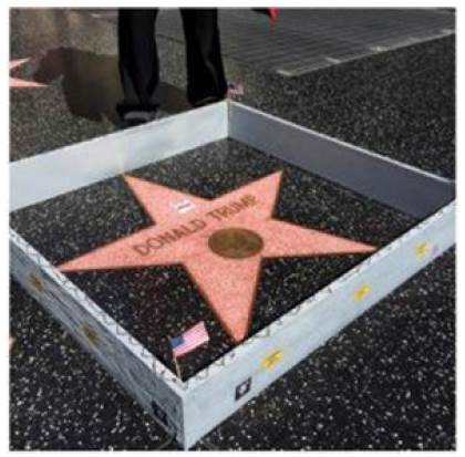 Muro miniatura alrededor de la estrella de Donald Trump (2016)
