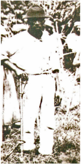 Detalhe do feitor portando um chicote na m&atilde;o direita. Recorte da Figura 7