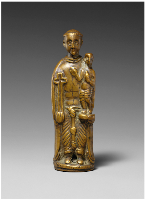 − Saint Anthony figure. Kongo Kingdom, possibly 17th − 18th century. Brass, height: 10 cm. The Metropolitan Museum of Art. Gift of Ernst Anspach, 1999, inv. 1999.295.1. Photograph: © The Metropolitan Museum of Art.