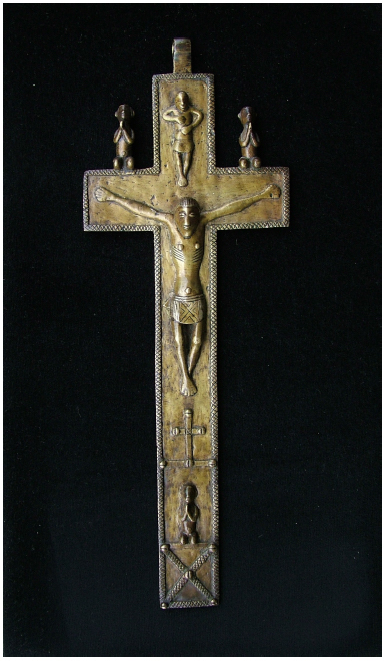 −Kongo Crucifix. Unknown artist. Possibly 18th century. Kongo Kingdom. Brass, 40 x 20 cm. Private collection (Photograph of the author).