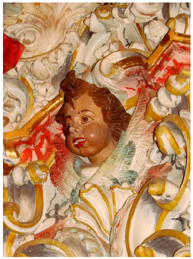 Figura antropom&oacute;rfica do ret&aacute;bulo de S&atilde;o Miguel e Almas, igreja Matriz de Nossa Senhora da Concei&ccedil;&atilde;o, Catas Altas (2015). 