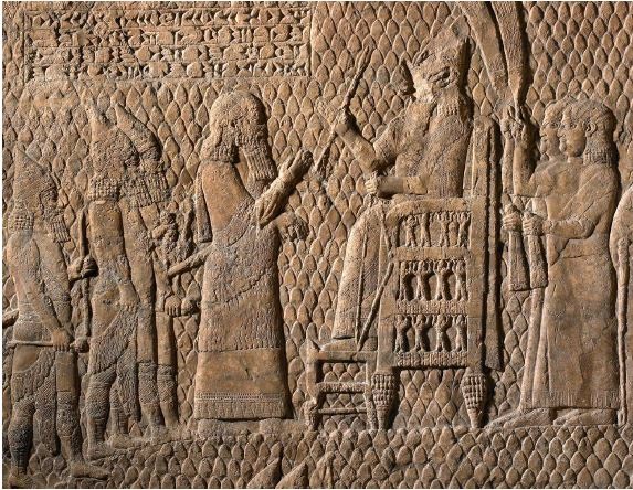 “Gypsum wall panel relief; carved in low relief; Sennacherib watches the capture of Lachish. Production date: 700-692 BCE”.