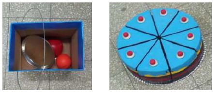 Objetos redondos varios y pastel de goma EVA.