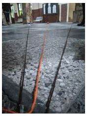 �ngulo marcado con lana en el piso.