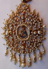 Joya de pecho con la Virgen con el
Niño. La Palma, c. 1705.