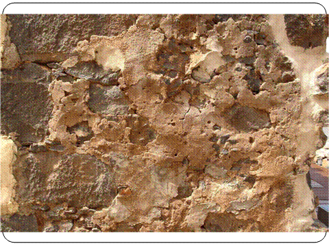 El enfoscado de la ermita de San Miguel, t&eacute;cnica constructiva que se repite en el muro del convento de Santo Domingo. (Foto: elaboraci&oacute;n propia).