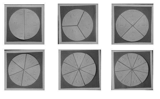 Fotografias dos materiais manipuláveis. Originalmente, os discos estavam na cor vermelha.