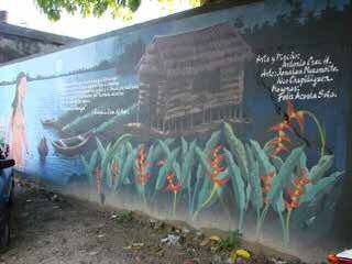 Mural paisajístico 2. Mujer saliendo del agua.
Carrera 8, Leticia