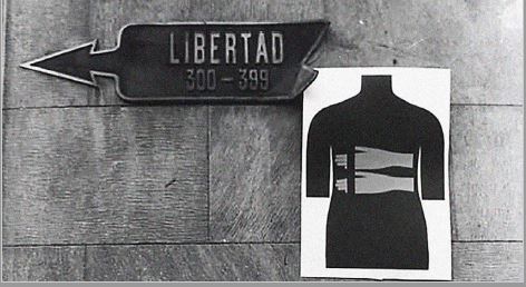 Luz Donoso, de la serie Calados para marcar fechas y lugares determinados en la ciudad, 1978, fotograf&iacute;a de intervenci&oacute;n con afiche en espacio p&uacute;blico, 113 x 81 cm. Propiedad del archivo Luz Donoso. From: Paulina E. Varas.