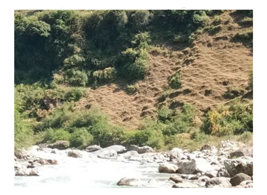 A layer of frozen ground pushed up by accumulation of ice does not support Vegetation after ice melts in the warmer month. Hat-Kalyani Chamoli Uttarakhand India