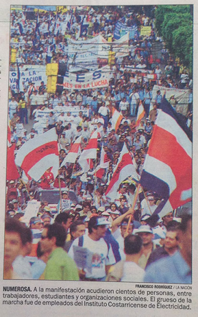 Fotograf&iacute;a y pie de foto de la noticia de D. Leal. 2004. ?Trabajadores marcharon contra el TCL?.
                La Naci&oacute;n, 1/6, p. 6A.
              