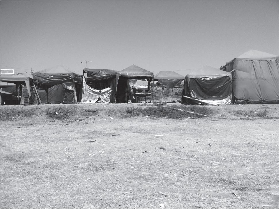 Carpas
temporales en un mercado informal en el cantón de Durán, 2016.