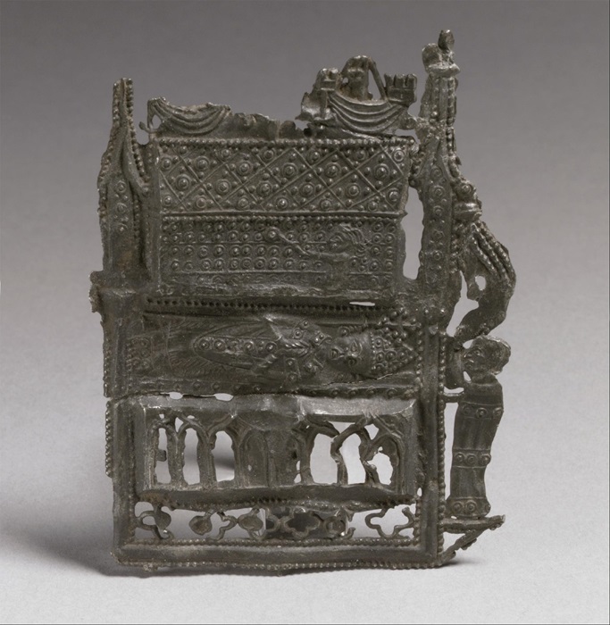 : Ins�gnia de peregrino com o santu�rio de S. Thomas Becket. Inglaterra, 1350-1400. Liga de estanho e chumbo, 7,9 x 6,4 x 0,3 cm. The Metropolitan Museum of Art, Nova York (2001.310).