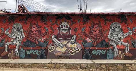 «La vida es un carnaval / calaveras y diablitos invaden mi corazón» por Muertitos de hambre