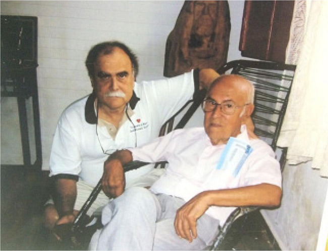Tomas with his father José in the city of Cássia, Brazil.