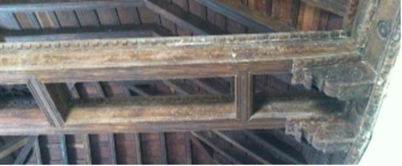 Tie rod beams on corbels.