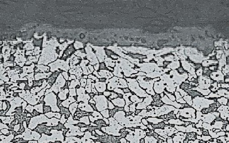 22 mm diameter, 200x magnified steel bar sample surface