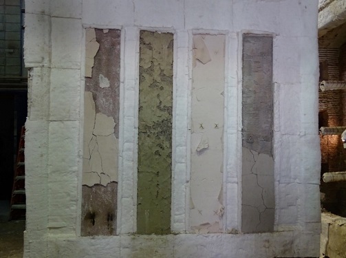 Detail of the elements and coatings condition after furnace opening (event 1): smooth formulated plaster coating, reference element, projected plaster coating and cement-based mortar coating.