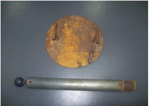 Proctor equipment, used to induce soil compaction.