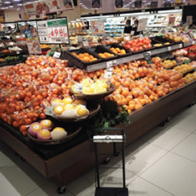 Cítricos en un supermercado japonés