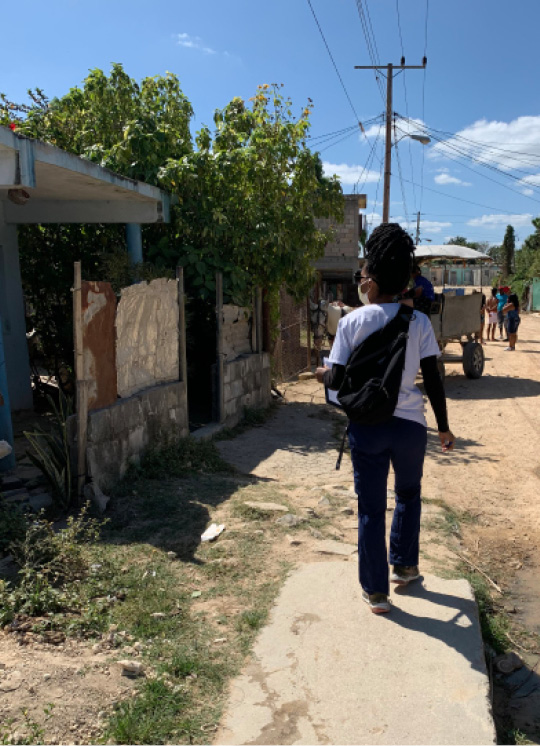 Six days a week, third-year US ELAM student Kaylaa Banks is actively screening at homes and businesses.