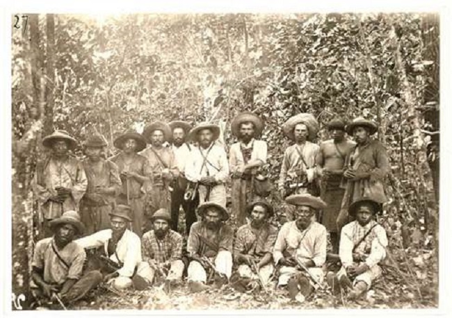 Herrmann Meyer (1871-1932) (center of back row, standing) in the Brazilian jungle during the first Xing&uacute; expedition, 1896.