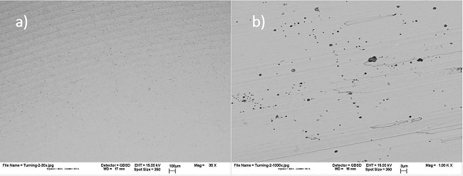 Steel counterbody surface analyzed by electron backscatter technique; a) 30-x magnification; b) 1,000-x magnification.