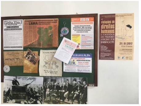 Bulletin board in MAB office in Rio de Janeiro. Note the poster for Arpilleras on the left-hand side