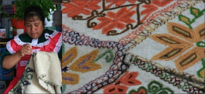 A photograph taken within the community showing a women taking part in
traditional hand textile crafts and the material produced.