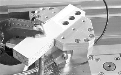General view of the jig holding the workpiece (in front of the jig base the accelerometer is visible).