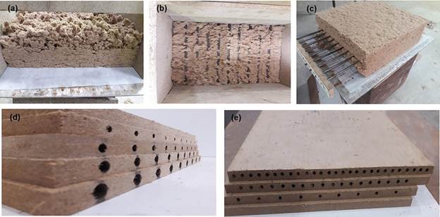 Production process of lightweight tubular fiberboard; (a) preparation the half of the fiber mat, (b) putting the rods collection in mat, (c) finalizing the whole fiber mat, (d) final tubular fiberboard with various holes diameter, (e) final tubular fiberboard with various holes’ number.