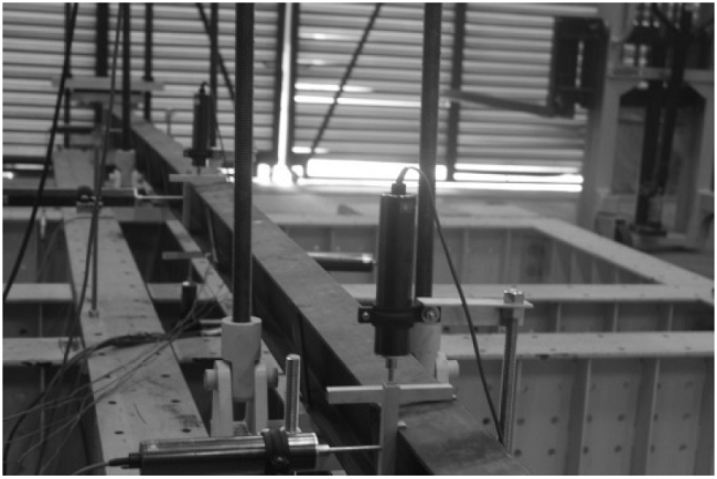 Lateral-torsional buckling of specimen.