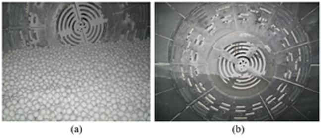 (a) picture of the mill before being unloaded; (b) picture of the mill after being unloaded.