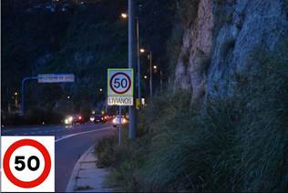 Figura 9. Resultados del sistema de
detecci&oacute;n de se&ntilde;ales de tr&aacute;nsito en el caso de velocidad de 50, durante un d&iacute;a oscuro
(al amanecer) en zona urbana; (a) imagen de entrada, (b) ROI y (c) detecciones.